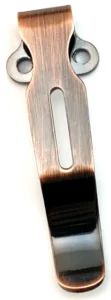 Copper-tone brushed clip with two mounting ears, a long slot and a dark reflective lower section