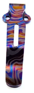 One upright multicolor slotted clip with flowing bands, two mounting ears and a rounded tip