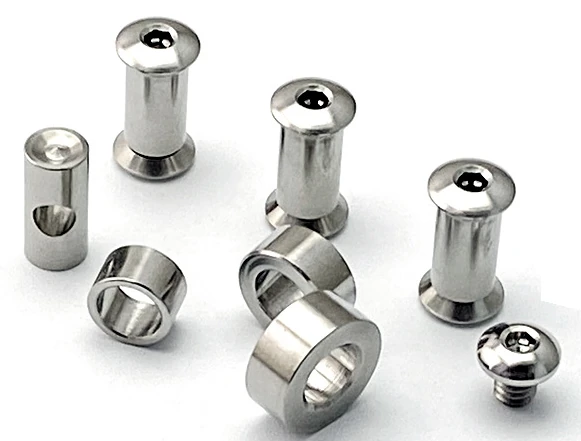 Loose cylindrical posts, hollow collars and a short screw from a Sebenza 21 supplier reference