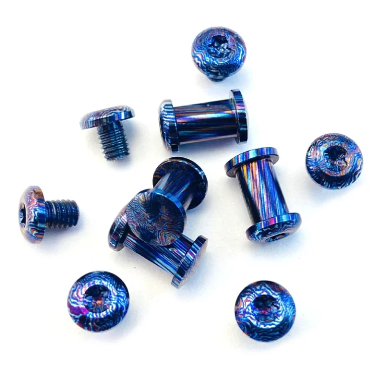 Patterned cylindrical pivot-like barrels and separate threaded screws with textured round heads