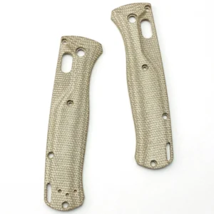 Two tan woven-pattern handle scales with oblong upper openings and several round mounting holes