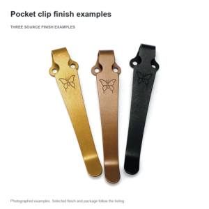 Three long pocket clips in gold-tone, bronze-tone and black, retaining their visible butterfly markings